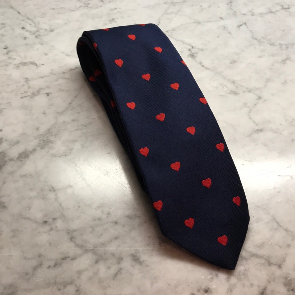 Navy blue tie with red hearts